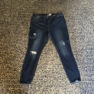 High waisted distressed jeans